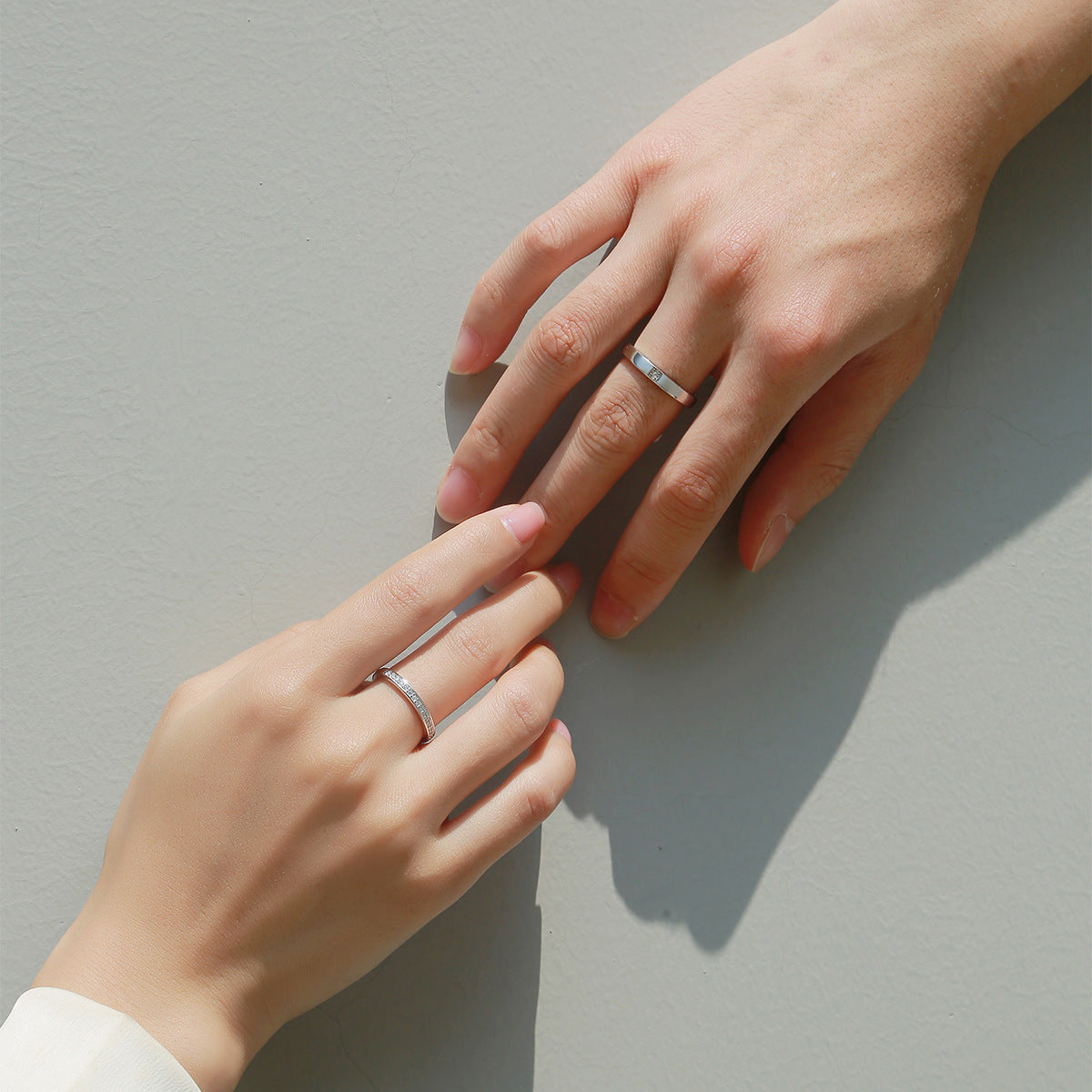 Minimalist open-face moissanite couple rings