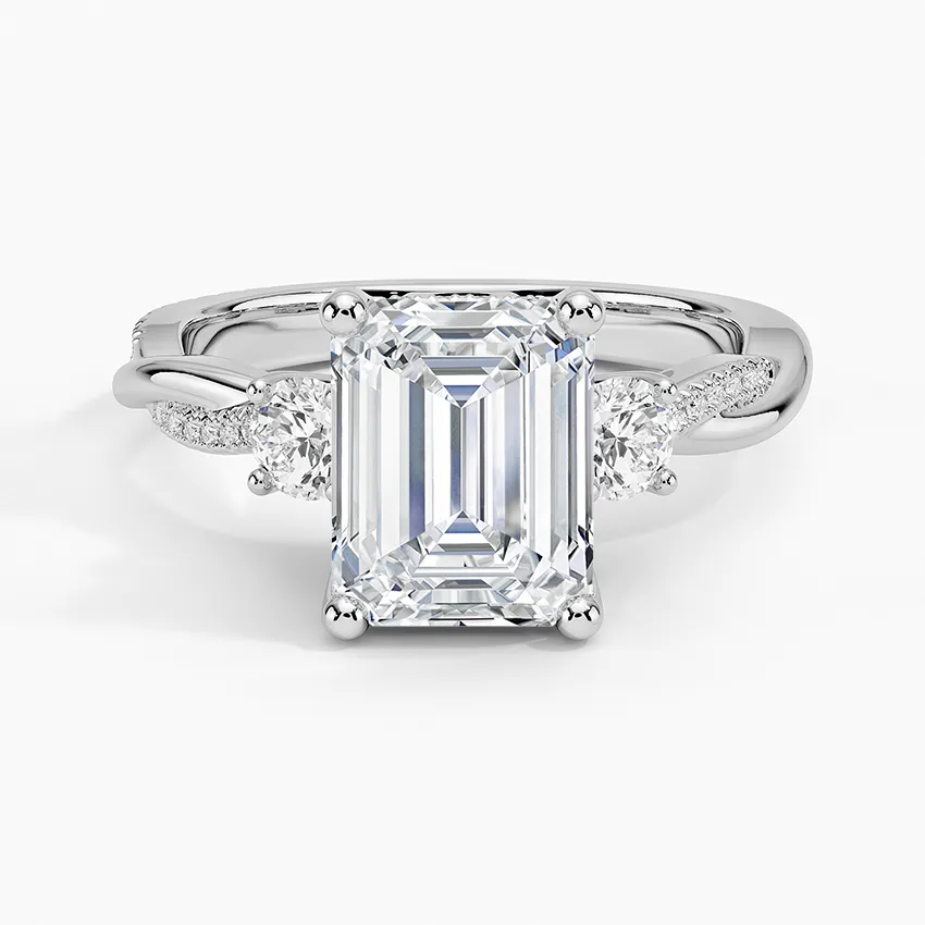 Twisted Band Emerald Cut Three Stone Moissanite Engagement Ring
