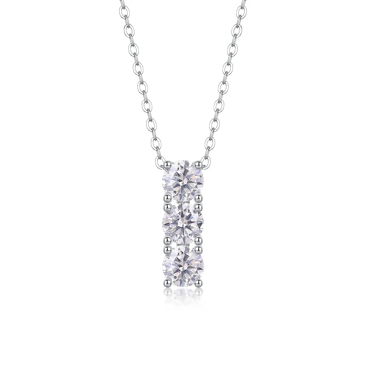 Vertical row of moissanite pendants
