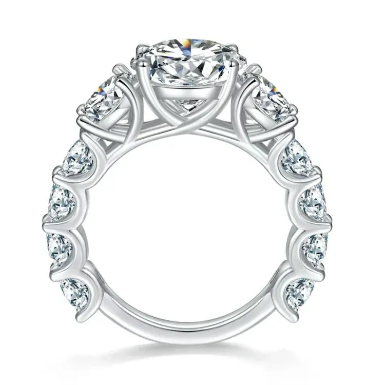 Three Stone Cathedral Four-Prong Side Details  Moissanite Engagement Ring