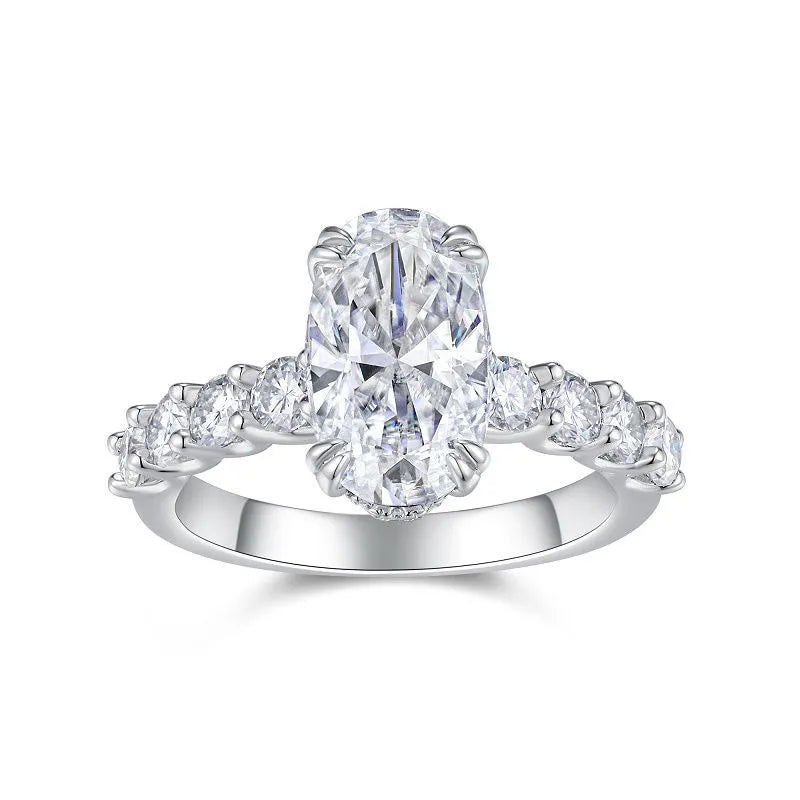 Elongated Oval Side Stone Double Prong Moissanite Engagement Ring