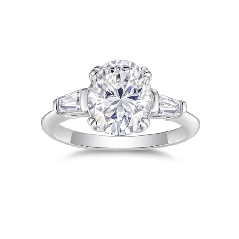 Tapered Baguette Three Stone Oval Moissanite Engagement Ring