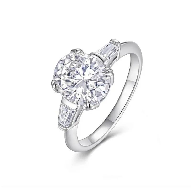 Tapered Baguette Three Stone Oval Moissanite Engagement Ring